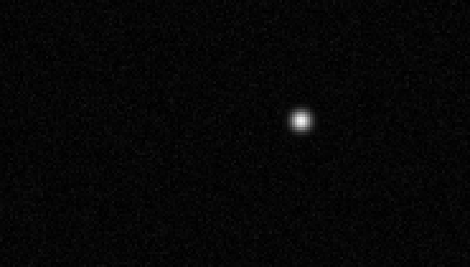 The force map display: a dark grid of pressure cells with one small bright spot where a ball rests on the pad