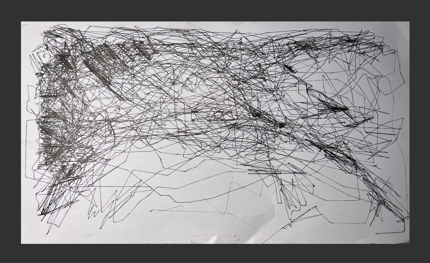 A drawing whose upper-left region is almost black with overlapping strokes while the lower region stays sparse