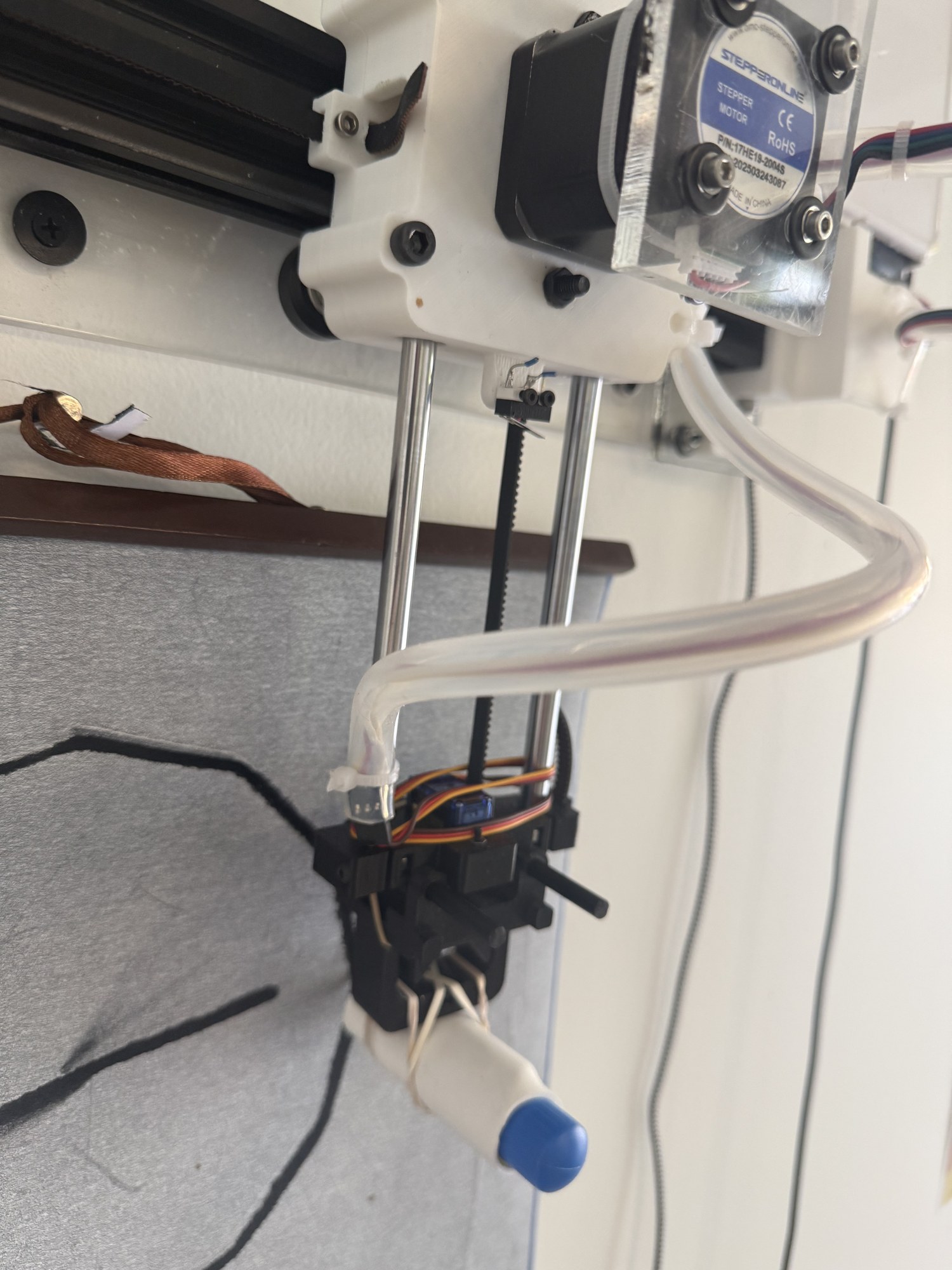 The wire tubing beside the y-arm